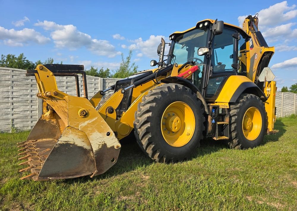 Caterpillar - Ekskavaator-laadur: pilt 1 Caterpillar - Ekskavaator-laadur: pilt 1