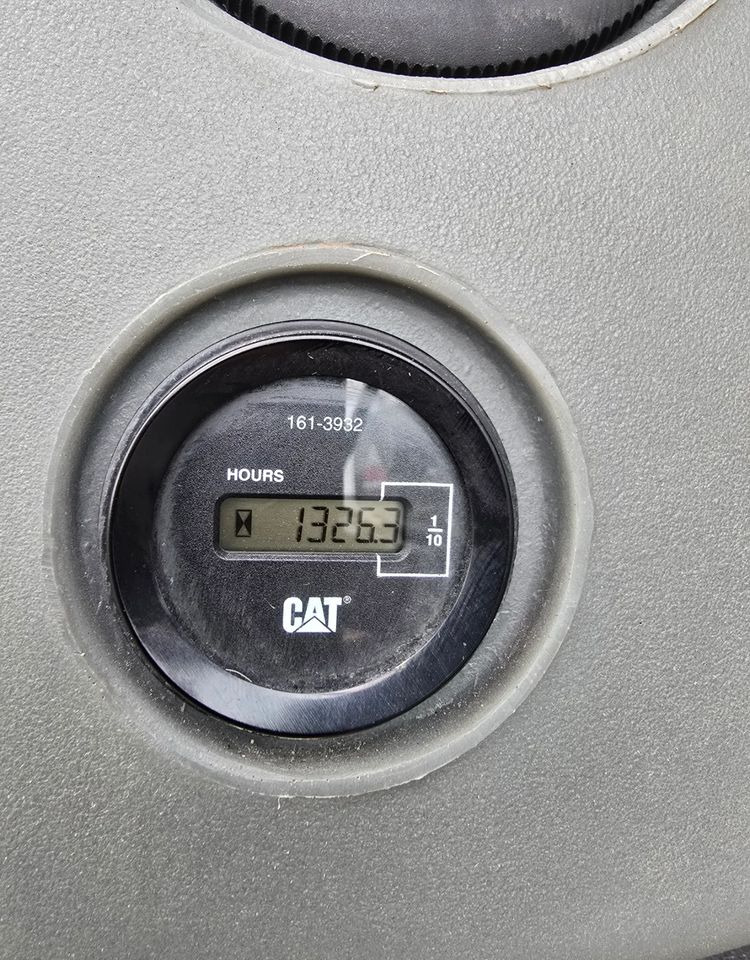 Caterpillar - Ekskavaator-laadur: pilt 4 Caterpillar - Ekskavaator-laadur: pilt 4