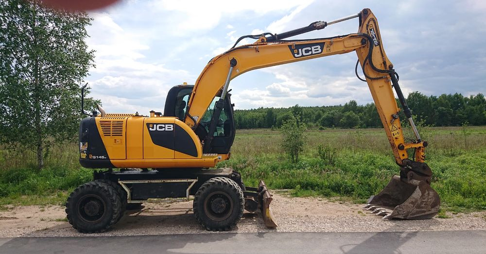 JCB - Ratastel ekskavaator: pilt 1 JCB - Ratastel ekskavaator: pilt 1