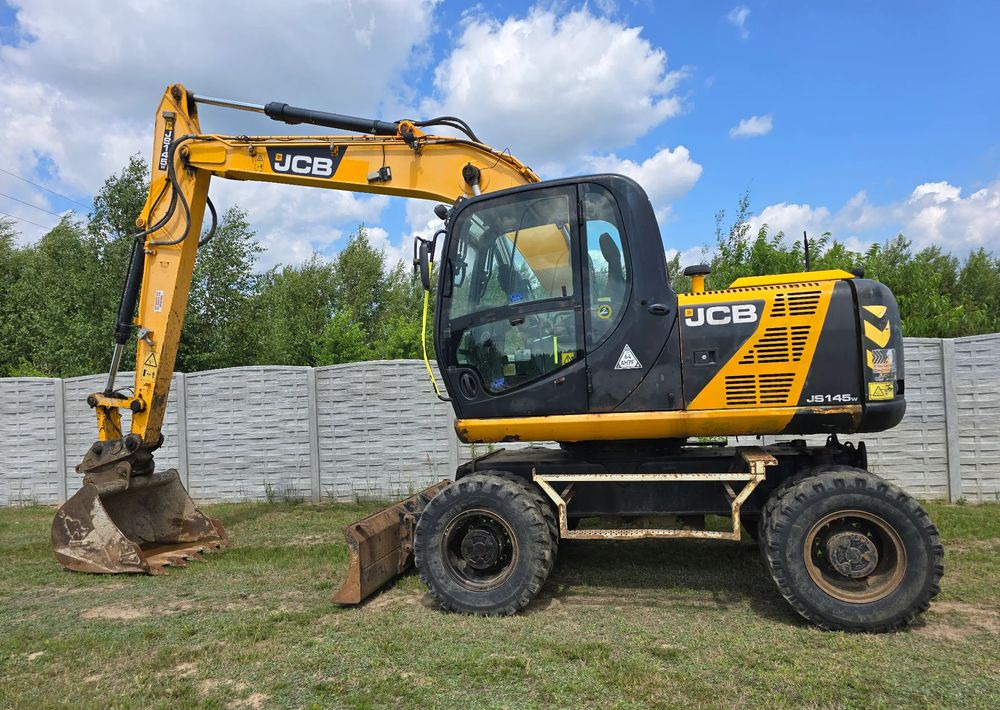JCB - Ratastel ekskavaator: pilt 1 JCB - Ratastel ekskavaator: pilt 1