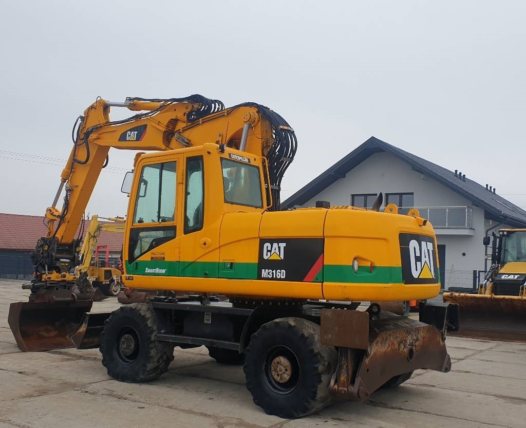 CAT M 316 D - Ratastel ekskavaator: pilt 2 CAT M 316 D - Ratastel ekskavaator: pilt 2