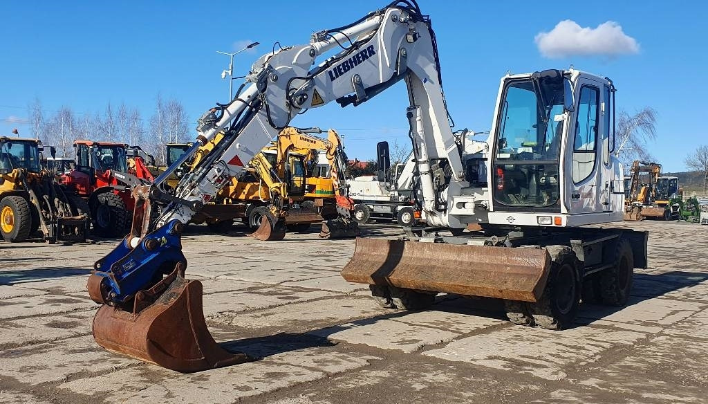 Liebherr A 309 Litronic - Ratastel ekskavaator: pilt 1 Liebherr A 309 Litronic - Ratastel ekskavaator: pilt 1