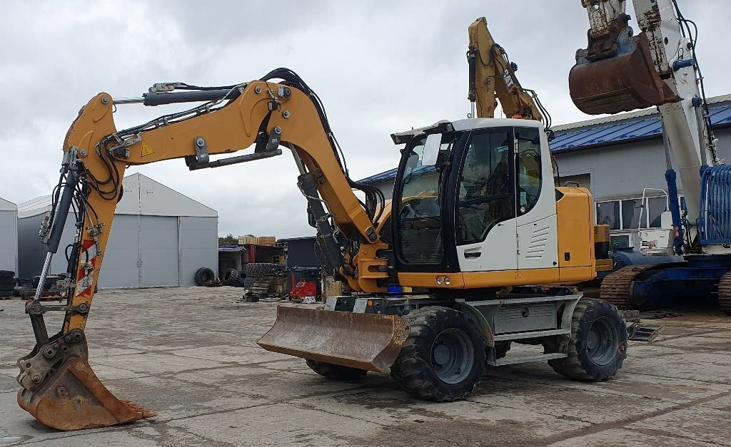 Liebherr A 910 compact - Ratastel ekskavaator: pilt 1 Liebherr A 910 compact - Ratastel ekskavaator: pilt 1