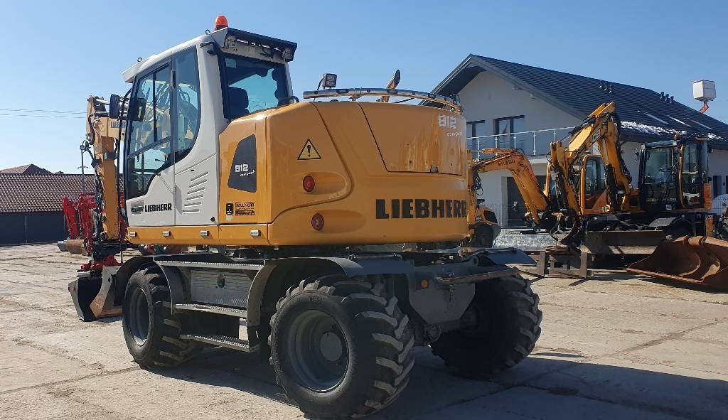 Liebherr A 912 compact - Ratastel ekskavaator: pilt 2 Liebherr A 912 compact - Ratastel ekskavaator: pilt 2