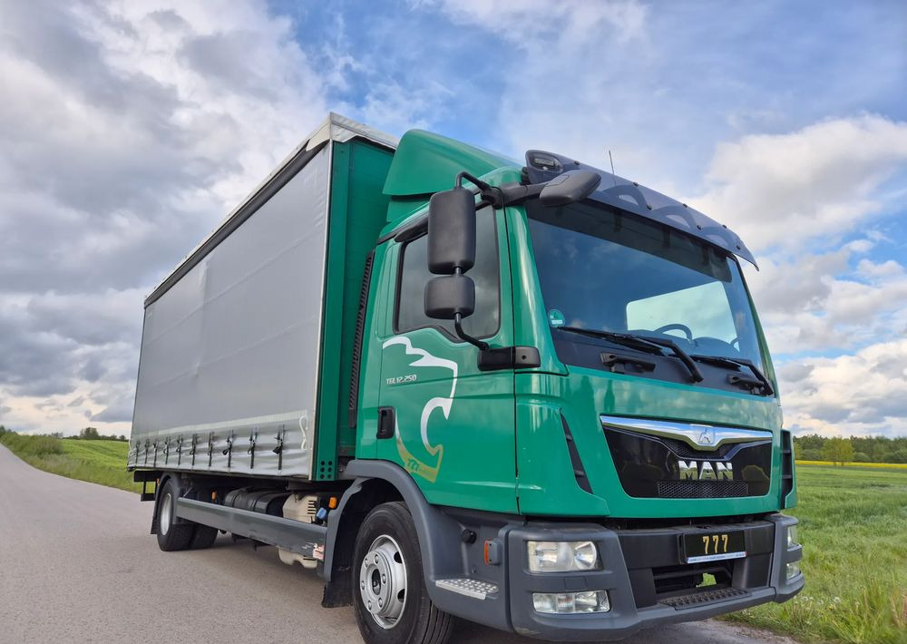 MAN TGL 12.250 6.2m AUTOMAT KLIMA z Niemiec ESP nowe opony EURO 6 / 4.75 rozstaw / zawiesie na wózek widłowy / TOP STAN / okazja nauka jazdy MOŻLIWOŚĆ DOSTOSOWANIA 12t - Tent veoauto: pilt 1 MAN TGL 12.250 6.2m AUTOMAT KLIMA z Niemiec ESP nowe opony EURO 6 / 4.75 rozstaw / zawiesie na wózek widłowy / TOP STAN / okazja nauka jazdy MOŻLIWOŚĆ DOSTOSOWANIA 12t - Tent veoauto: pilt 1