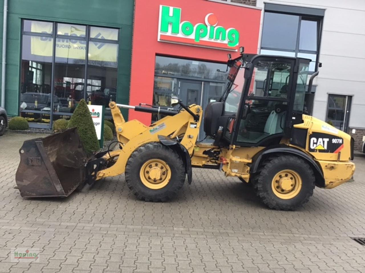 Caterpillar 907 H - Rataslaadur: pilt 1 Caterpillar 907 H - Rataslaadur: pilt 1
