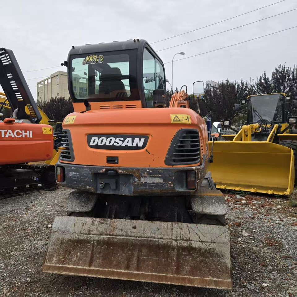 DOOSAN DX60W - Ratastel ekskavaator: pilt 4 DOOSAN DX60W - Ratastel ekskavaator: pilt 4