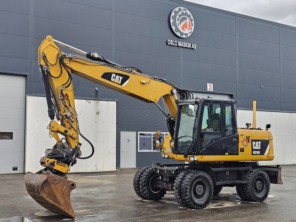 CAT M 316 D - Ratastel ekskavaator: pilt 1 CAT M 316 D - Ratastel ekskavaator: pilt 1