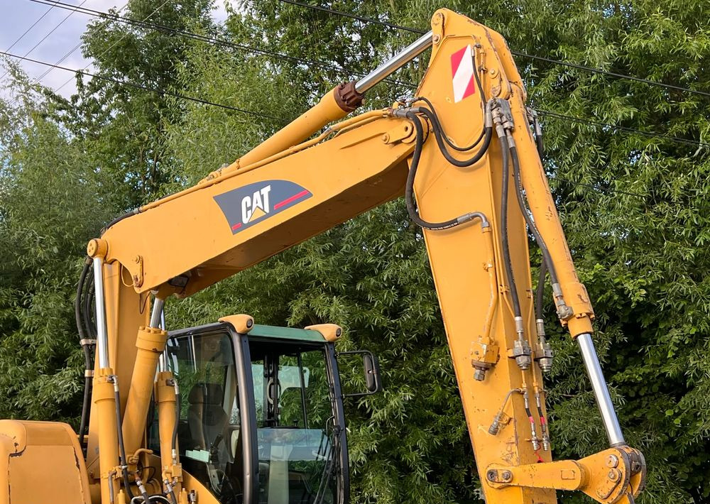 Caterpillar CAT M315C CATERPILLAR SPROWADZONY Bardzo Dobry Stan - Ratastel ekskavaator: pilt 3 Caterpillar CAT M315C CATERPILLAR SPROWADZONY Bardzo Dobry Stan - Ratastel ekskavaator: pilt 3