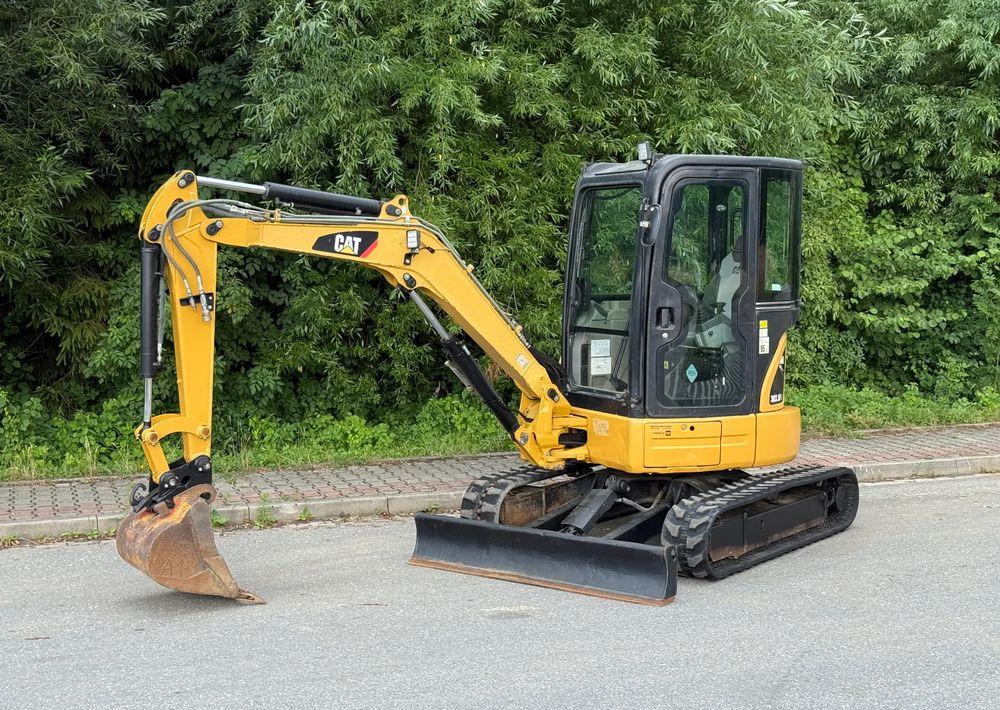 Caterpillar Minikoparka * CAT 303.5 E CR * Sprowadzona ! * Bardzo Dobry Stan * Minikoparka - Lintekskavaator: pilt 1 Caterpillar Minikoparka * CAT 303.5 E CR * Sprowadzona ! * Bardzo Dobry Stan * Minikoparka - Lintekskavaator: pilt 1