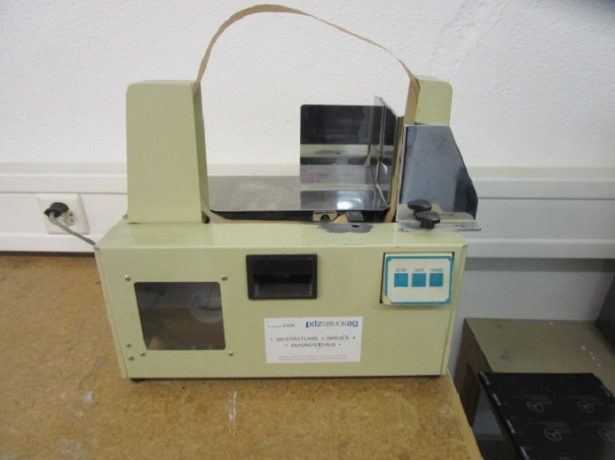 BANDEROLIERMASCHINE TANNER JC200 80 - Pakkimismasin: pilt 1 BANDEROLIERMASCHINE TANNER JC200 80 - Pakkimismasin: pilt 1