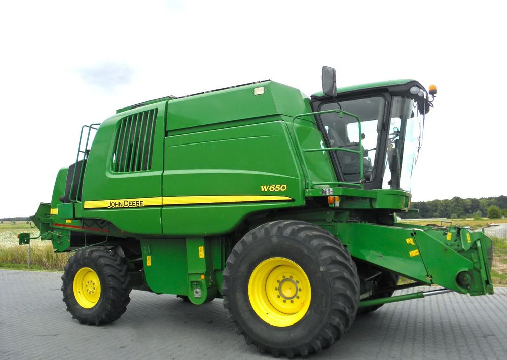 John Deere W650 2008 Rok, heder 6,7m, Nie Malowany, Stan Bardzo Dobry - Kombain: pilt 2 John Deere W650 2008 Rok, heder 6,7m, Nie Malowany, Stan Bardzo Dobry - Kombain: pilt 2