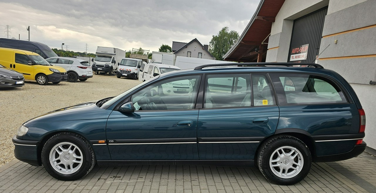 Opel Omega B 2,5 v6 *automat* napęd tył *welury* - Auto: pilt 4 Opel Omega B 2,5 v6 *automat* napęd tył *welury* - Auto: pilt 4