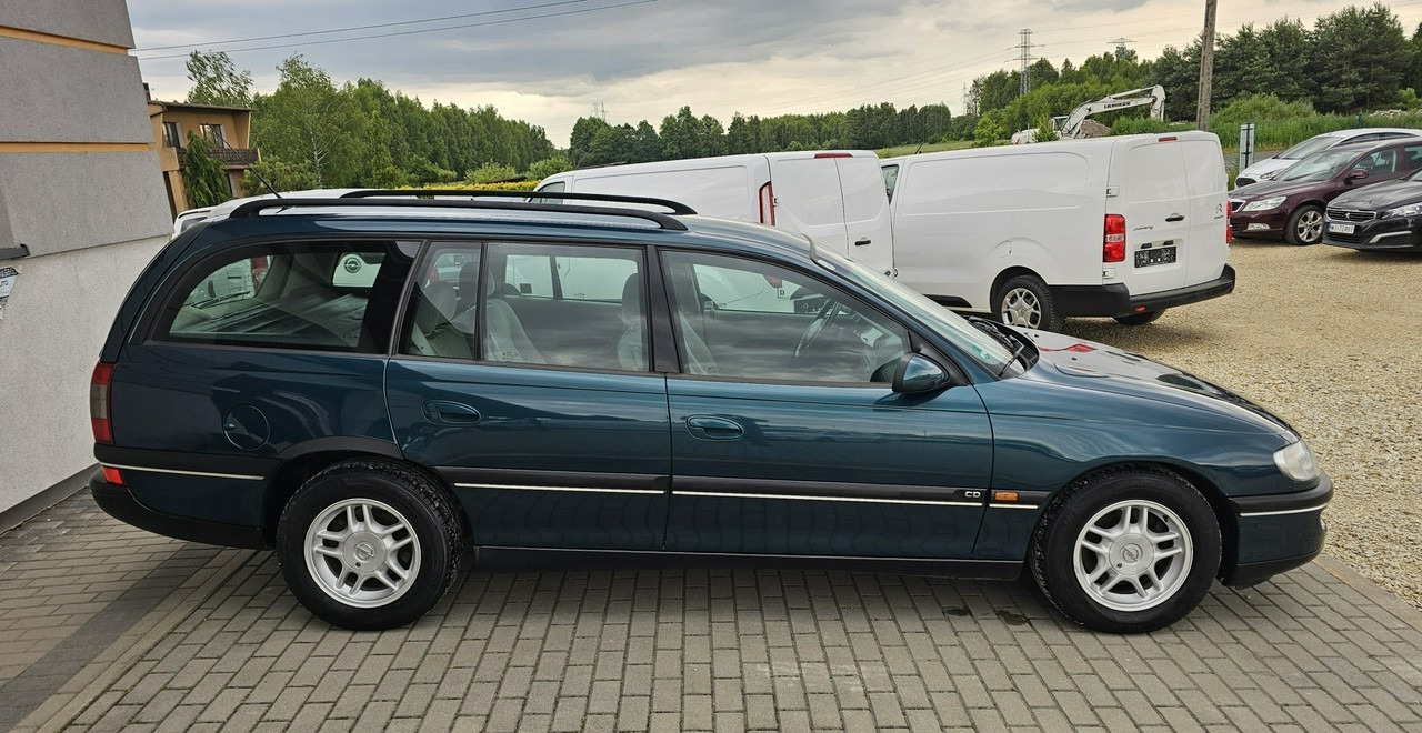 Opel Omega B 2,5 v6 *automat* napęd tył *welury* - Auto: pilt 5 Opel Omega B 2,5 v6 *automat* napęd tył *welury* - Auto: pilt 5