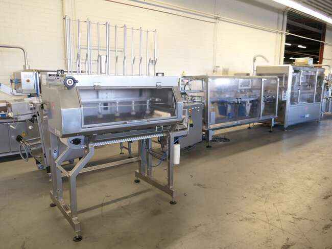 Tramper filling- and traysealing line GMD99-2 - Pakkimismasin: pilt 1 Tramper filling- and traysealing line GMD99-2 - Pakkimismasin: pilt 1
