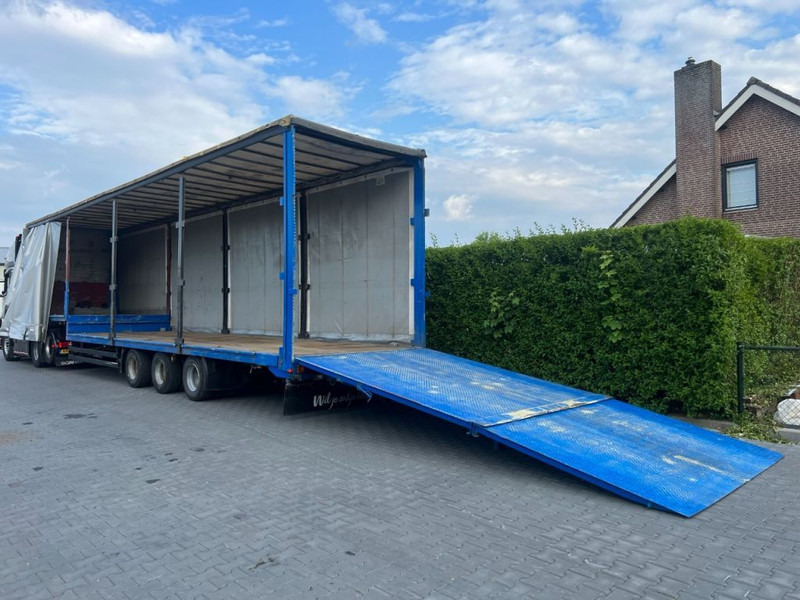Kögel Semi dieplader met oprijklep - Madal platvormpoolhaagis: pilt 1 Kögel Semi dieplader met oprijklep - Madal platvormpoolhaagis: pilt 1