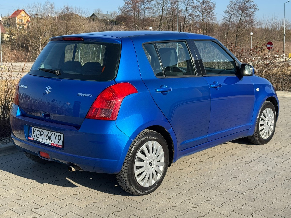 Suzuki Swift 1.3 benzyna 90km Klimatyzacja 136tys przebieg Auto prywatne zadbane - Auto: pilt 5 Suzuki Swift 1.3 benzyna 90km Klimatyzacja 136tys przebieg Auto prywatne zadbane - Auto: pilt 5