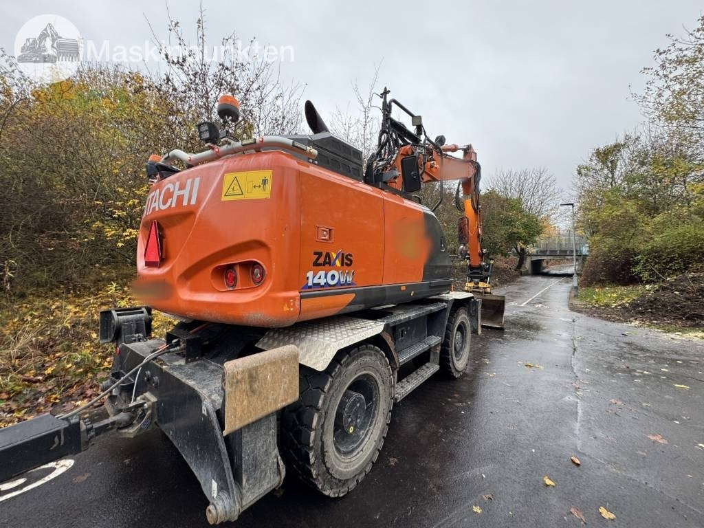 Hitachi ZX 140 W-6 Tippvagn med redskap - Ratastel ekskavaator: pilt 3 Hitachi ZX 140 W-6 Tippvagn med redskap - Ratastel ekskavaator: pilt 3