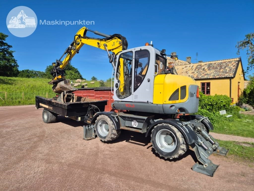 Wacker Neuson EW 100 med vagn - Ratastel ekskavaator: pilt 1 Wacker Neuson EW 100 med vagn - Ratastel ekskavaator: pilt 1