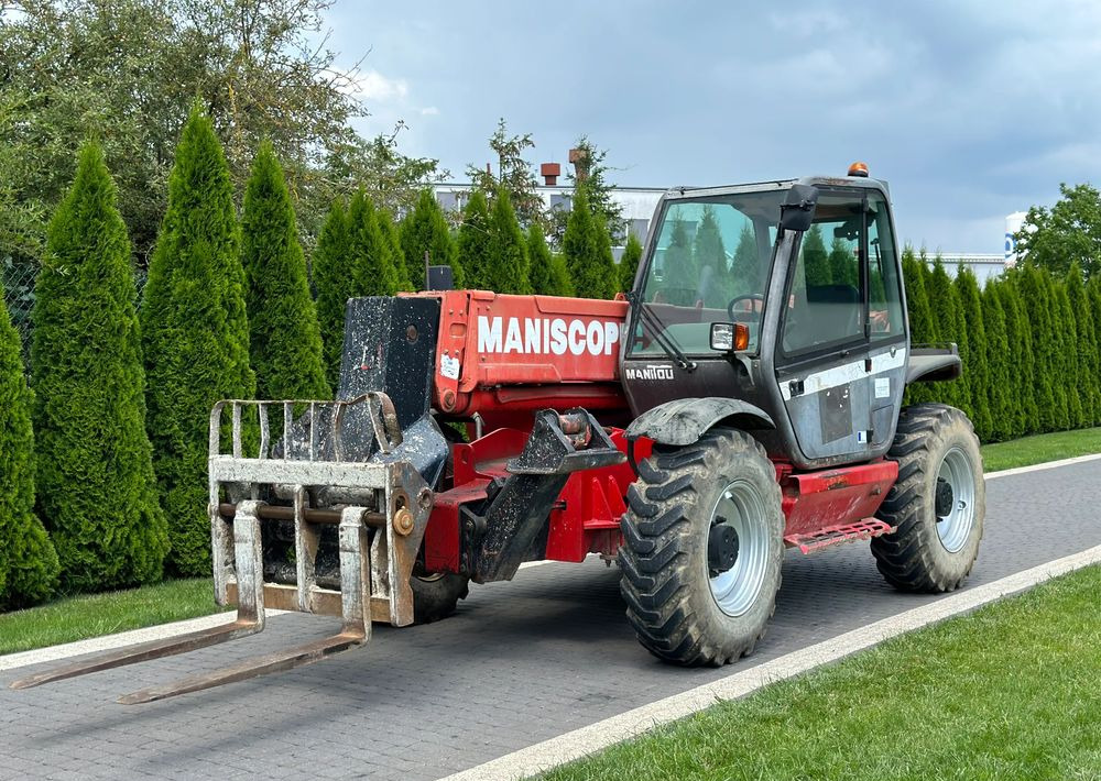 Manitou MT 1233S 12 M - Teleskooplaadur: pilt 1 Manitou MT 1233S 12 M - Teleskooplaadur: pilt 1