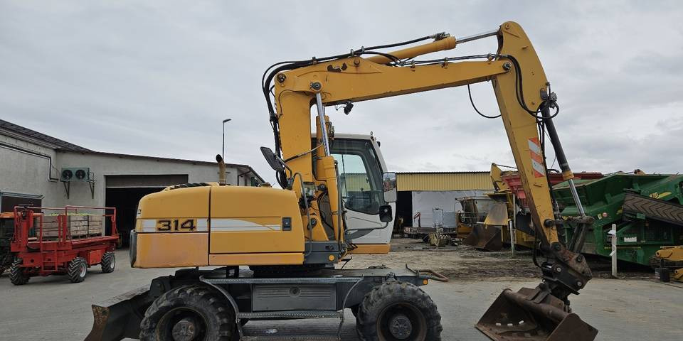 Koparka kołowa Liebherr A314 Litronic 9350 h+ 5 łyżek kołówka - Ratastel ekskavaator: pilt 5 Koparka kołowa Liebherr A314 Litronic 9350 h+ 5 łyżek kołówka - Ratastel ekskavaator: pilt 5
