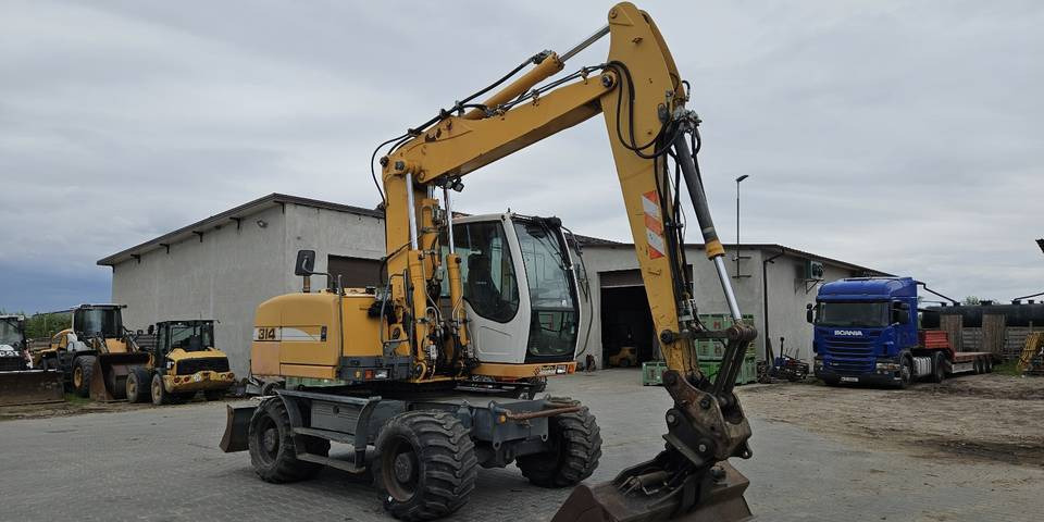 Koparka kołowa Liebherr A314 Litronic 9350 h+ 5 łyżek kołówka - Ratastel ekskavaator: pilt 4 Koparka kołowa Liebherr A314 Litronic 9350 h+ 5 łyżek kołówka - Ratastel ekskavaator: pilt 4