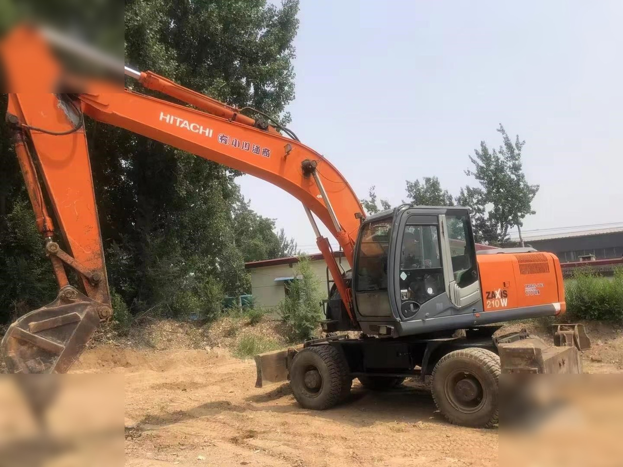 HITACHI ZX210W - Ratastel ekskavaator: pilt 3 HITACHI ZX210W - Ratastel ekskavaator: pilt 3