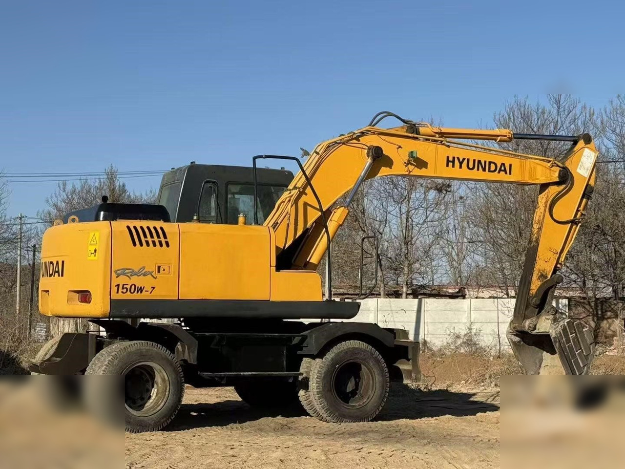 HYUNDAI ROBEX 150W-7A - Ratastel ekskavaator: pilt 2 HYUNDAI ROBEX 150W-7A - Ratastel ekskavaator: pilt 2