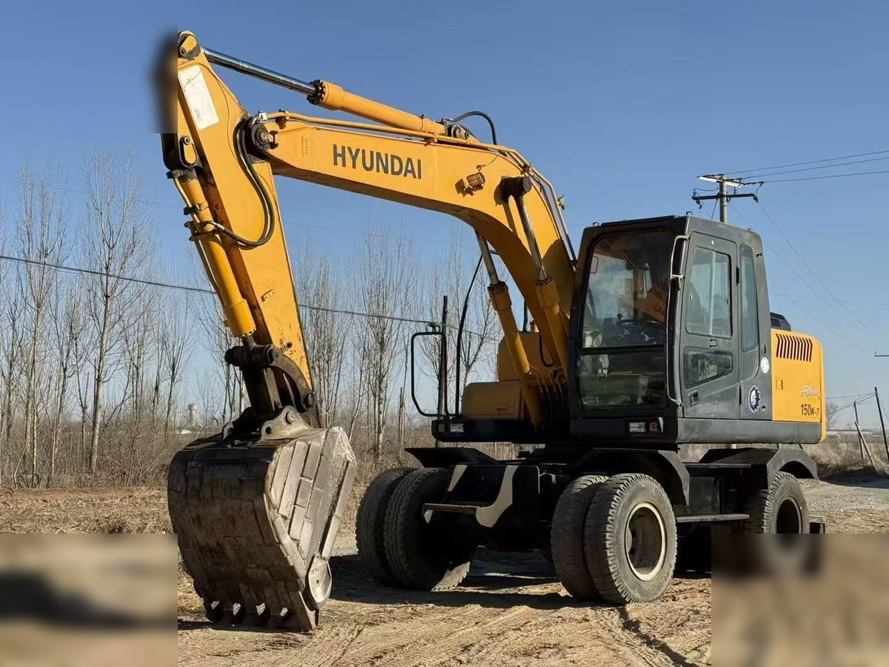 HYUNDAI ROBEX 150W-7A - Ratastel ekskavaator: pilt 3 HYUNDAI ROBEX 150W-7A - Ratastel ekskavaator: pilt 3