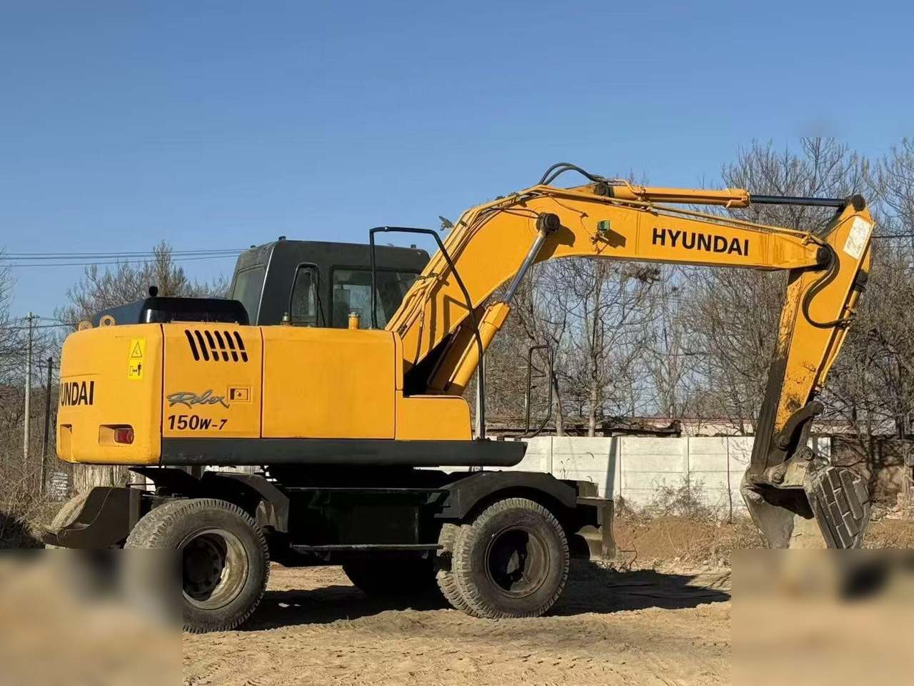HYUNDAI ROBEX 150W-7A - Ratastel ekskavaator: pilt 2 HYUNDAI ROBEX 150W-7A - Ratastel ekskavaator: pilt 2