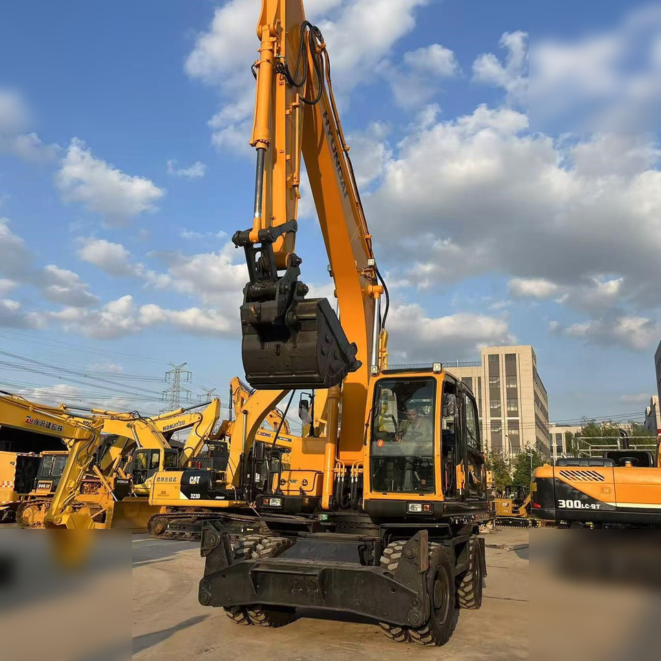 HYUNDAI ROBEX 210W-9 - Ratastel ekskavaator: pilt 2 HYUNDAI ROBEX 210W-9 - Ratastel ekskavaator: pilt 2