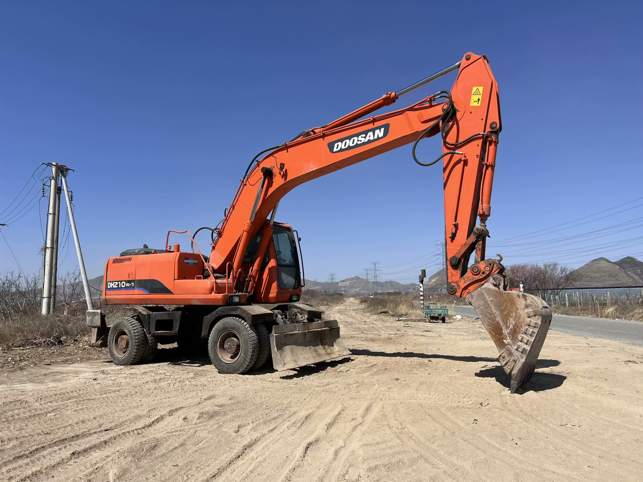 DOOSAN 210w - Ratastel ekskavaator: pilt 2 DOOSAN 210w - Ratastel ekskavaator: pilt 2