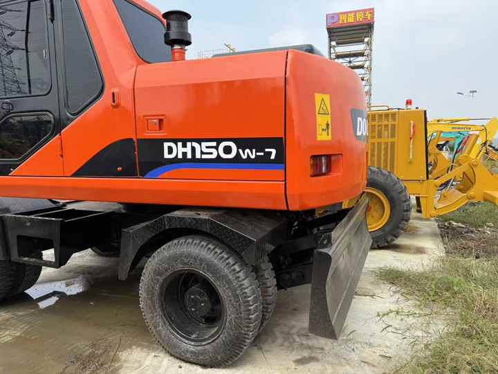 90% Brand New Doosan Brand Dh150w-7 Wheel Excavator in Stock Used Korea Brand Doosan Dh55 Dh60 Dh150 Dh210 Excavator for Sale - Ratastel ekskavaator: pilt 4 90% Brand New Doosan Brand Dh150w-7 Wheel Excavator in Stock Used Korea Brand Doosan Dh55 Dh60 Dh150 Dh210 Excavator for Sale - Ratastel ekskavaator: pilt 4