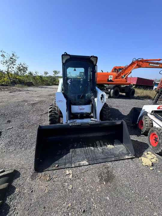 Skid Steer Loader Bobcat S550 Original Wheel Loader in Good Condition on Sale Bobcat 550 - Kompaktlaadur: pilt 2 Skid Steer Loader Bobcat S550 Original Wheel Loader in Good Condition on Sale Bobcat 550 - Kompaktlaadur: pilt 2