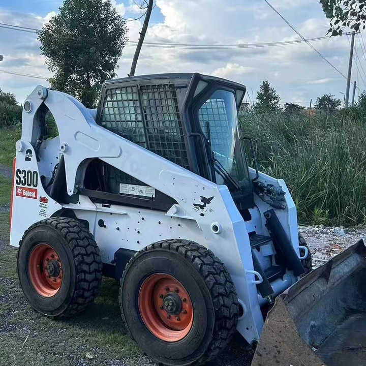 Used Bob Cat Bob Cat S300 Used Mini Skid Steer Wheel Loader Multifunctional Track Loaders Bobcat S300 - Kompaktlaadur: pilt 1 Used Bob Cat Bob Cat S300 Used Mini Skid Steer Wheel Loader Multifunctional Track Loaders Bobcat S300 - Kompaktlaadur: pilt 1