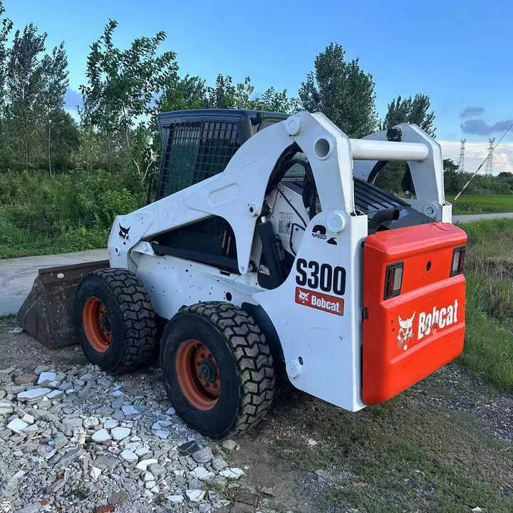 Used Bob Cat Bob Cat S300 Used Mini Skid Steer Wheel Loader Multifunctional Track Loaders Bobcat S300 - Kompaktlaadur: pilt 3 Used Bob Cat Bob Cat S300 Used Mini Skid Steer Wheel Loader Multifunctional Track Loaders Bobcat S300 - Kompaktlaadur: pilt 3
