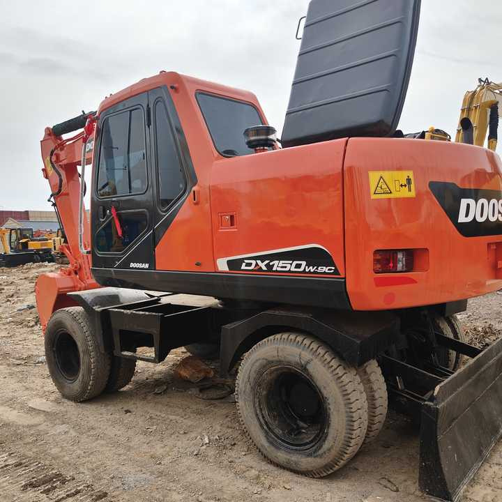 Used Original Doosan Dx150w-9 Wheel Excavator for Sale - Ratastel ekskavaator: pilt 1 Used Original Doosan Dx150w-9 Wheel Excavator for Sale - Ratastel ekskavaator: pilt 1