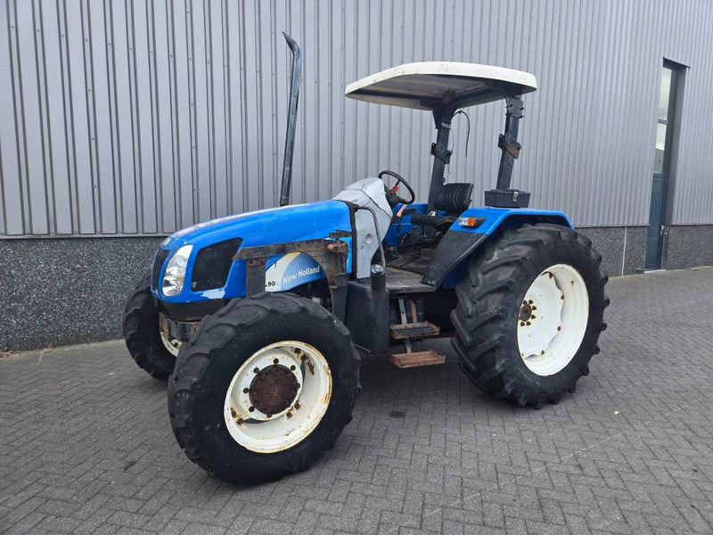 New Holland TL 90 A - Traktor: pilt 1 New Holland TL 90 A - Traktor: pilt 1
