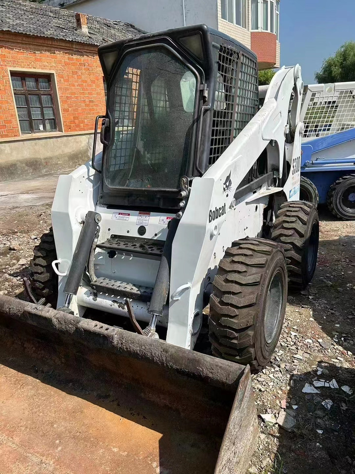 High Quality Mini Construction Machine Used Bobcat Skid Steer Loader S300 in Stock for Sale Bobcat Loader With Low Price - Kompaktlaadur: pilt 1 High Quality Mini Construction Machine Used Bobcat Skid Steer Loader S300 in Stock for Sale Bobcat Loader With Low Price - Kompaktlaadur: pilt 1