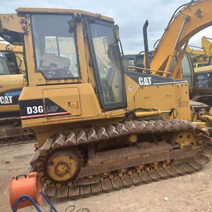 Used Caterpillar CAT D3G Land Road Motor Bulldozer CAT Used Grader Cheap Price for Sale - Buldooser: pilt 1 Used Caterpillar CAT D3G Land Road Motor Bulldozer CAT Used Grader Cheap Price for Sale - Buldooser: pilt 1