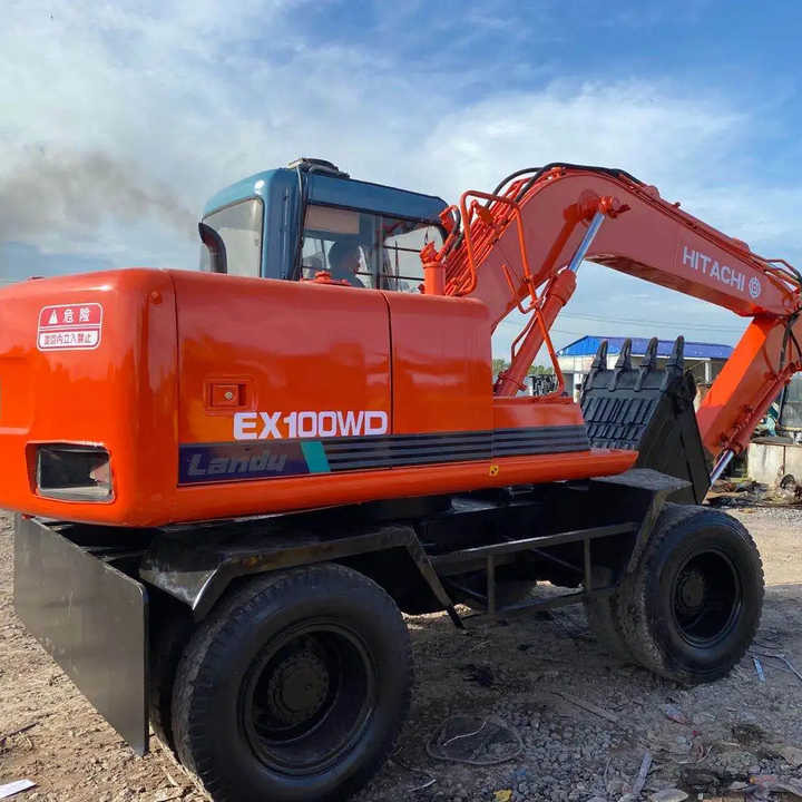 Used Hitachi Ex100WD Wheel Excavator for Sale Japan Made Hitachi Ex100wd Wheeled Excavator for Sale - Ratastel ekskavaator: pilt 1 Used Hitachi Ex100WD Wheel Excavator for Sale Japan Made Hitachi Ex100wd Wheeled Excavator for Sale - Ratastel ekskavaator: pilt 1