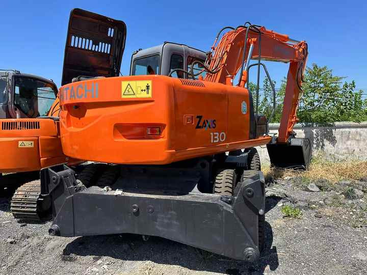 Used Wheel Excavator Hitachi ZX 130W Made in Japan 13ton Hitachi Zx130w Wheel Excavator Price Used Hitachi Zx130 Excavator SALE - Ratastel ekskavaator: pilt 2 Used Wheel Excavator Hitachi ZX 130W Made in Japan 13ton Hitachi Zx130w Wheel Excavator Price Used Hitachi Zx130 Excavator SALE - Ratastel ekskavaator: pilt 2
