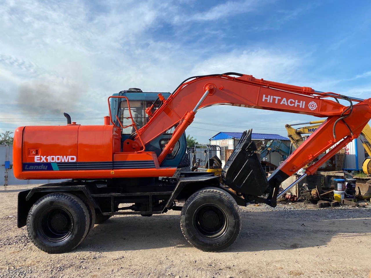 HITACHI EX100WD - Ratastel ekskavaator: pilt 1 HITACHI EX100WD - Ratastel ekskavaator: pilt 1