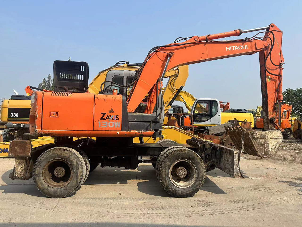 HITACHI ZX130 - Ratastel ekskavaator: pilt 1 HITACHI ZX130 - Ratastel ekskavaator: pilt 1