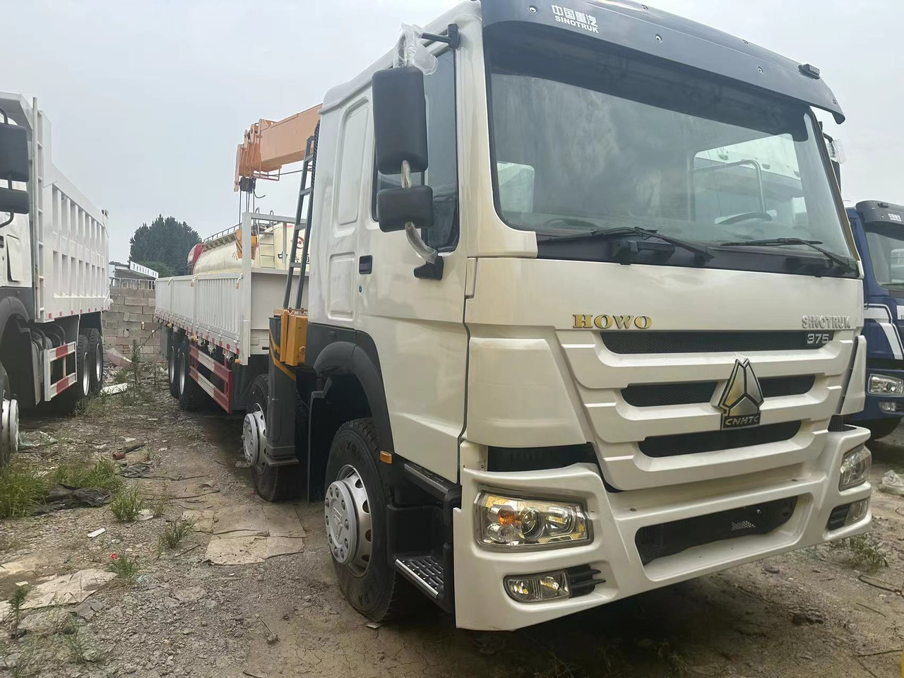 SINOTRUK HOWO 375 8X4 12TONS CLICK HERE FOR DISCOUNT - Kraanaga veoauto: pilt 1 SINOTRUK HOWO 375 8X4 12TONS CLICK HERE FOR DISCOUNT - Kraanaga veoauto: pilt 1
