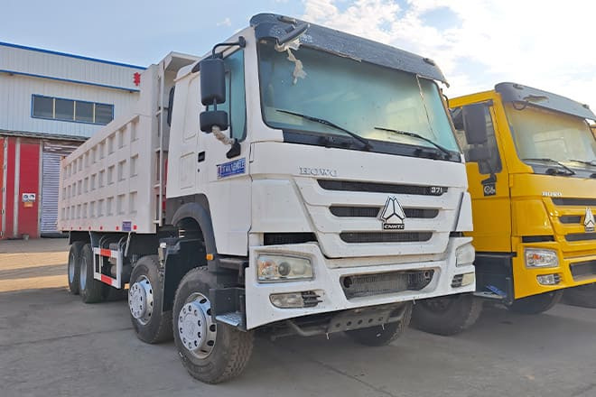 SINOTRUK Sino Howo 8x4 Dump Truck 371 for Sale in Sierra Leone - Kallurauto: pilt 1 SINOTRUK Sino Howo 8x4 Dump Truck 371 for Sale in Sierra Leone - Kallurauto: pilt 1