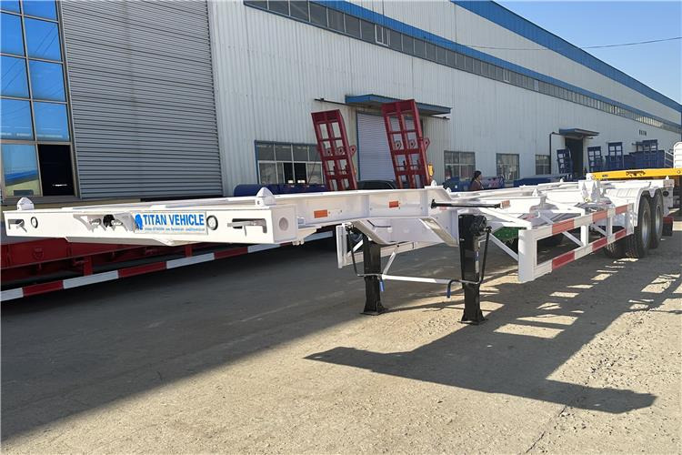 TITAN 2 Axle 40ft Container Transport Trailer for Sale In Nigeria - Šassii poolhaagis: pilt 1 TITAN 2 Axle 40ft Container Transport Trailer for Sale In Nigeria - Šassii poolhaagis: pilt 1
