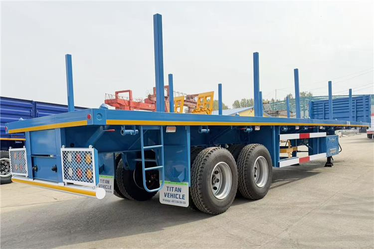 TITAN 2 Axle Wood Log Trailer Flatbed Trailer for Sale In Zimbabwe - Platvorm/ Madelpoolhaagis: pilt 1 TITAN 2 Axle Wood Log Trailer Flatbed Trailer for Sale In Zimbabwe - Platvorm/ Madelpoolhaagis: pilt 1