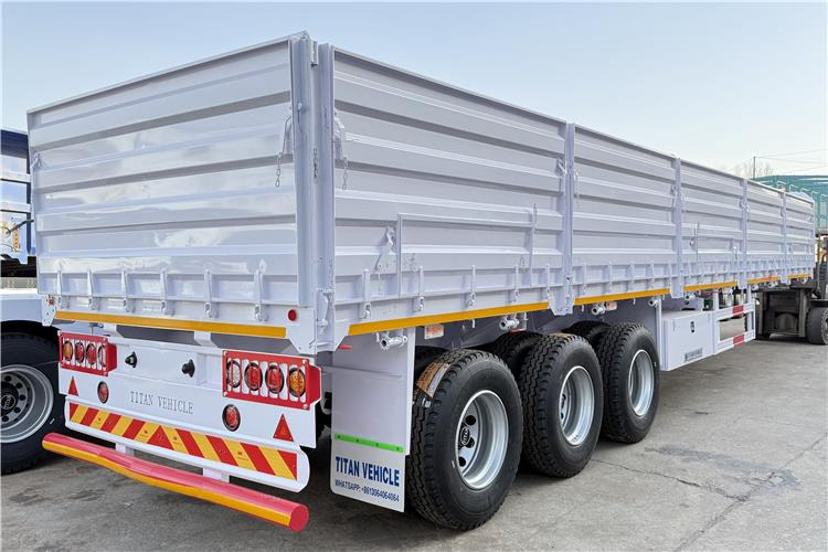 TITAN 2025 New 60 Ton Dropside Wall Trailer for Sale In Zimbabwe - Platvorm/ Madelpoolhaagis: pilt 1 TITAN 2025 New 60 Ton Dropside Wall Trailer for Sale In Zimbabwe - Platvorm/ Madelpoolhaagis: pilt 1