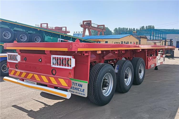 TITAN 2025 New China Flatbed Trailer with Single Tires In Kenya - Šassii poolhaagis: pilt 1 TITAN 2025 New China Flatbed Trailer with Single Tires In Kenya - Šassii poolhaagis: pilt 1